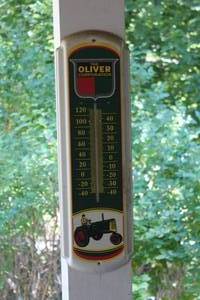 lot 222 image: Vintage Oliver Tractor Metal Wall Thermometer
