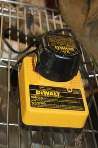 lot 99 image: DeWalt Battery Charger with 9.6V Cordless Tool Battery