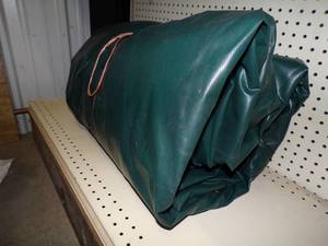 Large Heavy Duty Tarp for Woodpile may have holes or rips