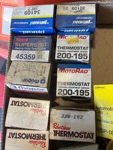 Box of car carts  Thermostats gas cap