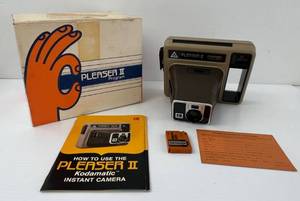 lot 93 image: Vintage Kodak Pleasurer II Kodamatic Instant Camera With Original Box Manuals And Battery