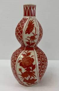 lot 97 image: Vintage Japanese Porcelain Orange And White Sake Bottle With Oriental Theme 7 x 3 12 (No Cracks Or Chips)