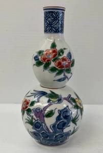 lot 98 image: Vintage Japanese Porcelain Multi-Colored Sake Bottle With Oriental Theme 7 x 3 12  (No Cracks Or Chips)