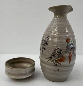 lot 104 image: Vintage Japanese Clay Oriental Themed Sake Bottle With Cup 4 12 x 2 12