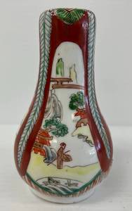 lot 108 image: Vintage Japanese Porcelain Oriental Themed Sake Bottle With Cup 5 x 3 (No Cracks Or Chips)