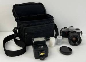 lot 116 image: Vintage Minolta XG 1 With Lens And Case