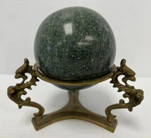 lot 244 image: Vintage 4 Marble Ball On Brass Dragon Themed Base
