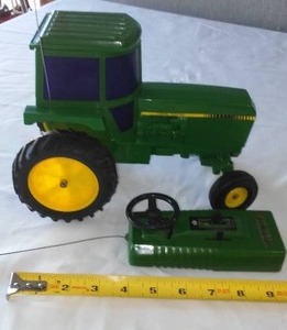 lot 2 image: John Deere Remote Control Tractor