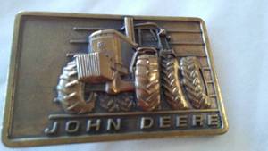 lot 31 image: John Deere Belt Buckle 1982