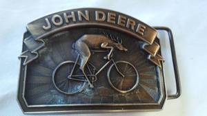 lot 32 image: John Deere Belt Buckle No. 921