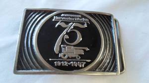 lot 33 image: John Deere Belt Buckle Harvester Works No. 289