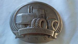 lot 34 image: John Deere Belt Buckle 60s Series 4 WD Tractors 1989