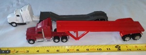 lot 49 image: (2) Flatbed Tractor Trailer Semis.