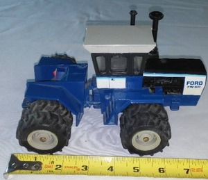 lot 59 image: Ford FW - 60 Tractor No. 551