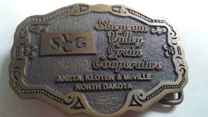 lot 73 image: Belt Buckle Sheyenne Valley Grain Cooperatives