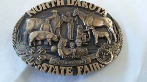 lot 77 image: Belt Buckle N.D. State Fair 1985