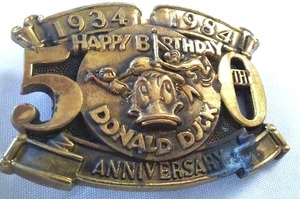 lot 112 image: Disney Donald Duck Belt Buckle 50th Birthday