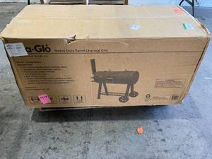 lot 49 image: Dyna-Glo Signature Heavy-Duty Barrel Charcoal Grill in Black