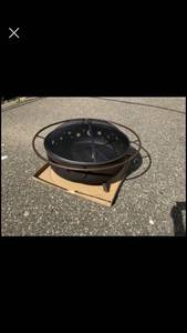 lot 59 image: Sunnydaze Decor Cosmic 42 in. x 23 in. Large Round Steel Wood Burning Fire Pit with Spark Screen