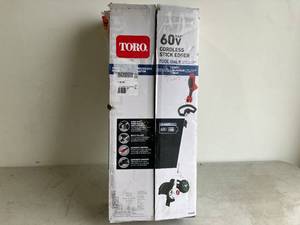 lot 40 image: Toro 8 in. 60V Max Lithium Ion Cordless Electric Lawn Edger - Battery and Charger Not Included