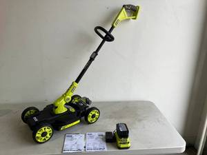 lot 65 image: Ryobi ONE 18V 12 in. Cordless 3-in-1 Trim Mower with 4.0 Ah Battery and Charger