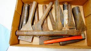 Primitive hand forged wedge chisels etcfor blacksmithwood splitting