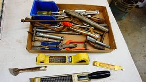 Assorted hand tools and hardware