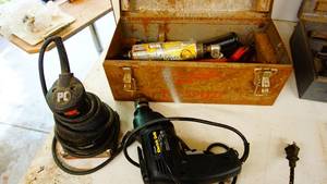 Porter cable Sander, 38 inch electric drill, metal toolbox With miscellaneous items