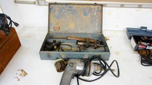Metal case of Bosch bulldog rotary hammer accessories, Black & Decker industrial drill