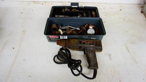 Black and decker 38 inch drill, plastic tote of sharpening tools etc.