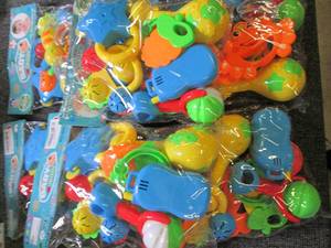 lot 148 image: 6 packages of baby rattles ...