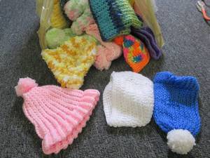 lot 265 image: bag full of quilted baby hats ...