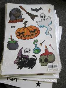 lot 518 image: 94 packs of halloween window cling...