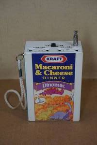 lot 192 image: Vintage Novelty Kraft Macaroni and Cheese Dinomac Portable Radio