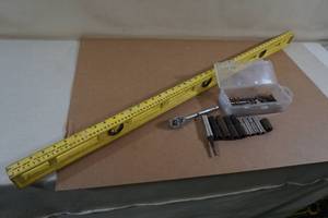 lot 219 image: Hand Tools - Ratchet, Sockets, Level