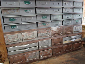 lot 1 image: Metal parts cabinets 34Wx11Dx14H...