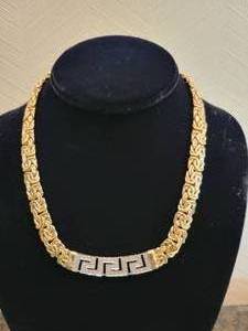 lot 31 image: 14K Yellow Gold Necklace with Pave Set Diamonds. 41 grams total weight.
