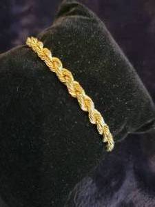 lot 36 image: Fabulous 14K Yellow Gold Rope Bracelet  7 38 long. Excellent condition. Hallmarked 14K.