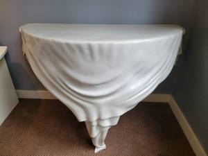 lot 84 image: Half Moon Table with Drape decoration.