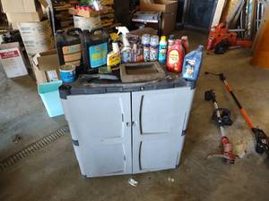 lot 80 image: Two shelf plastic cabinet with assorted automotive fluids