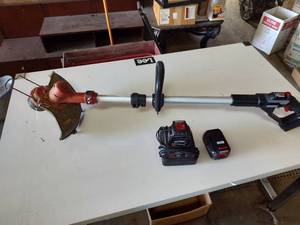 lot 88 image: Craftsman 13 weed whip with 2 40v batteries and charger