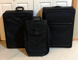 lot 93 image: Trio of Tumi Rolling Luggage
