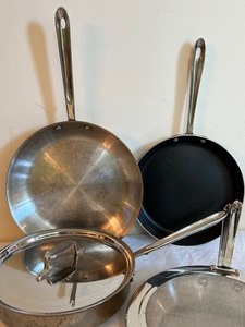 lot 169 image: Four All Clad Frying Pans