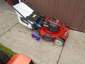 Toro 7 hp recycler personal pace mower with bagger. Runs but will need a little tlc. As shown.