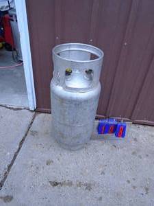 Forklift propane tank. Needs fitting for hose connection. As shown.