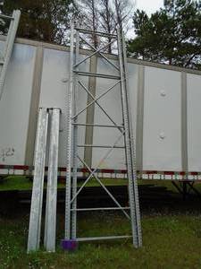 Qty of 2 16 x 4 galvanized pallet rack uprights with 6 cross members. Good used condition. As shown.