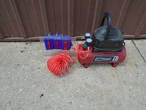 Tool Shop 2 gal air compressor with hose. Tested & works. As shown.