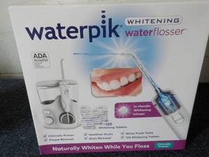 Waterpik Whitening Water Flosser...