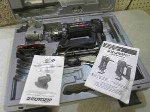 lot 227 image: (EW6) RotoZip Spiral Saw with Case...
