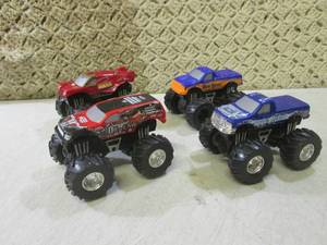 lot 246 image: (EC1) 4 Toy Monster Trucks...